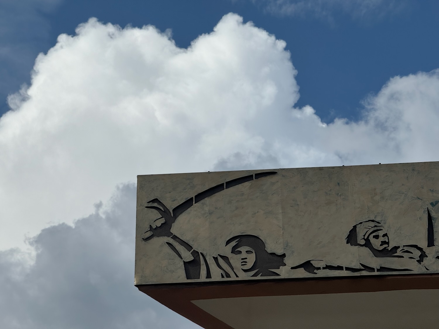 a wall with a picture of two people on it