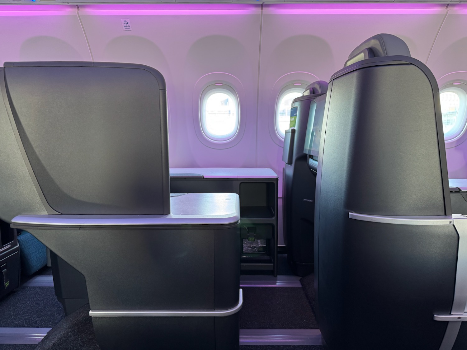 a seat and table in an airplane