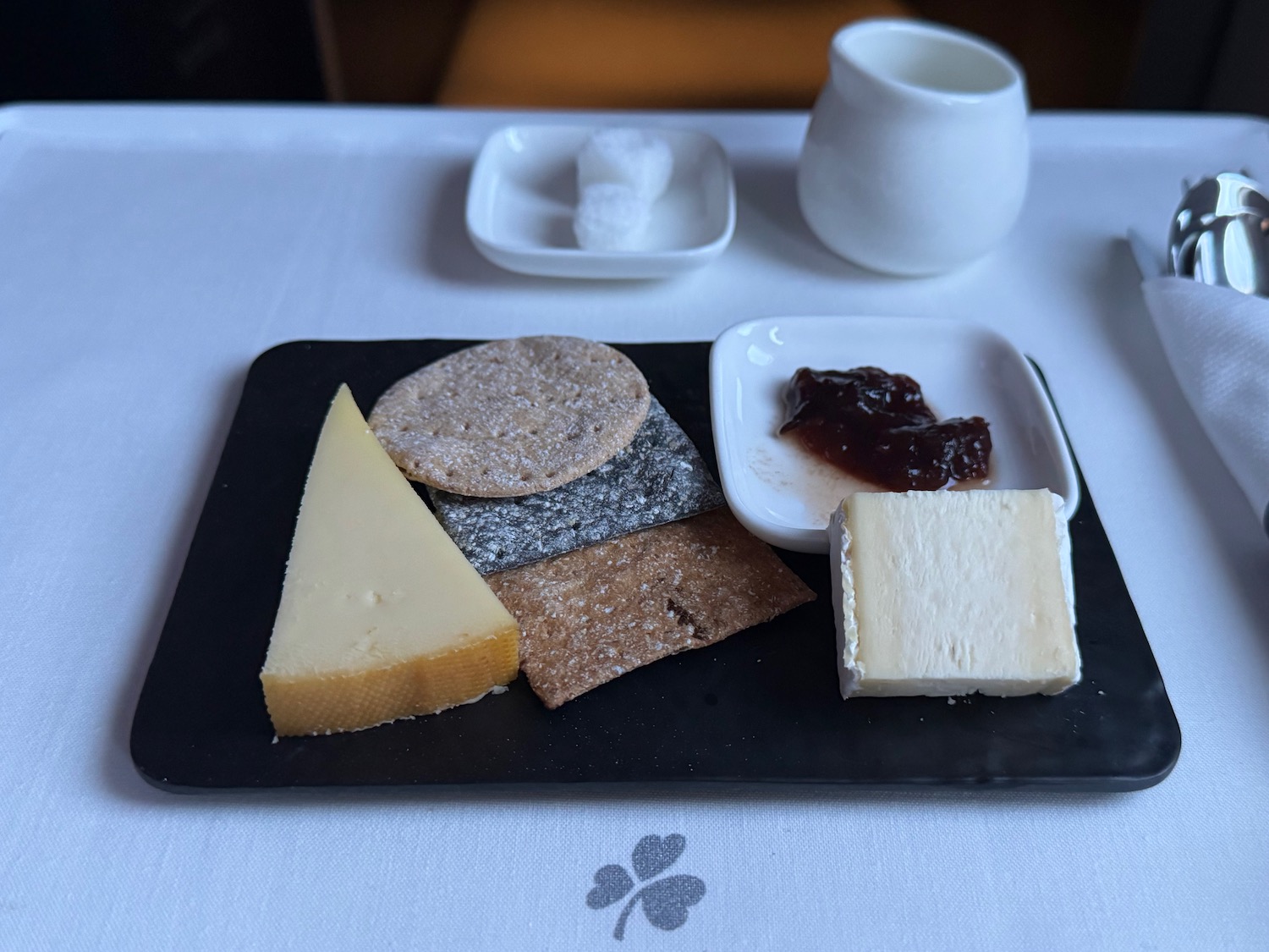 a plate of cheese and crackers