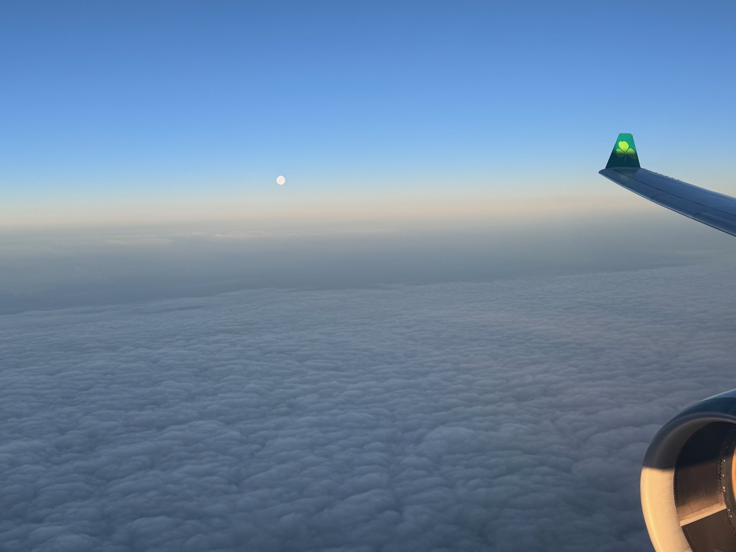 an airplane wing in the sky