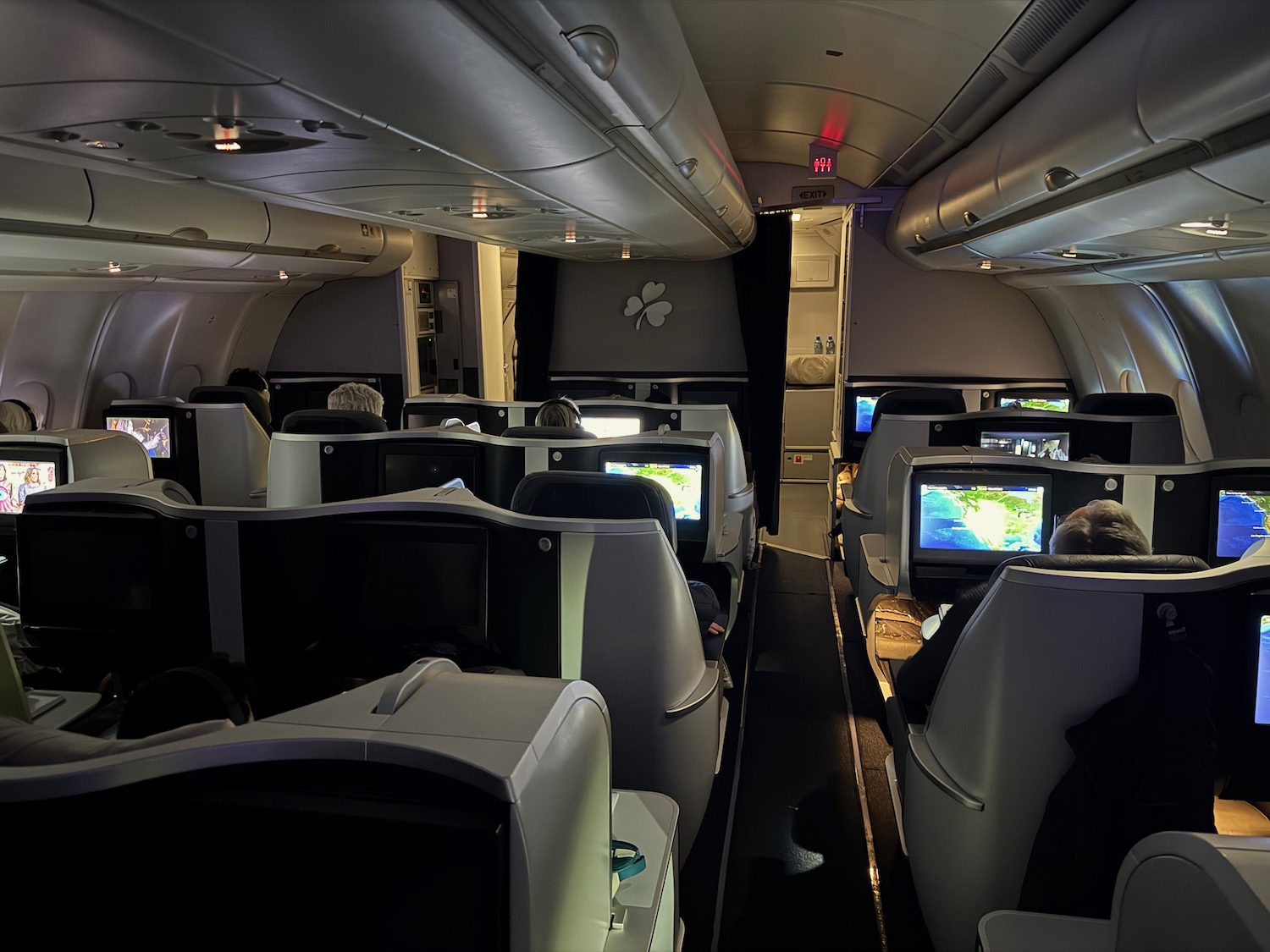 a group of people sitting in an airplane