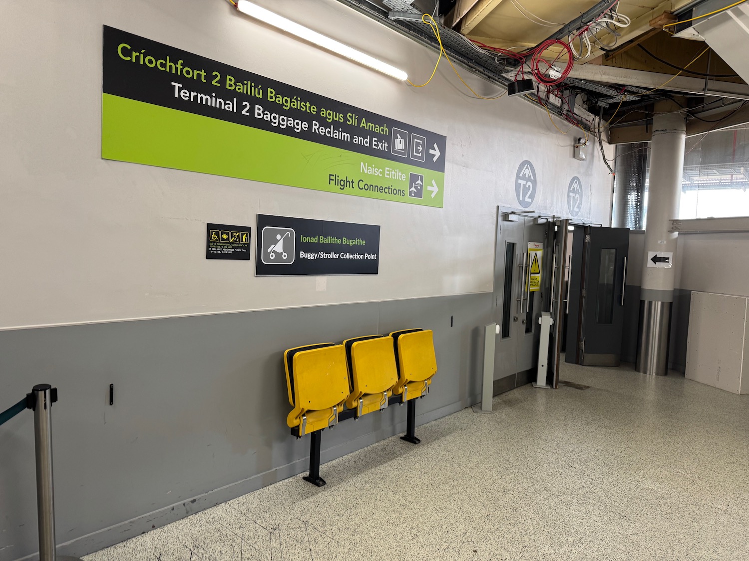 a row of yellow chairs in a room