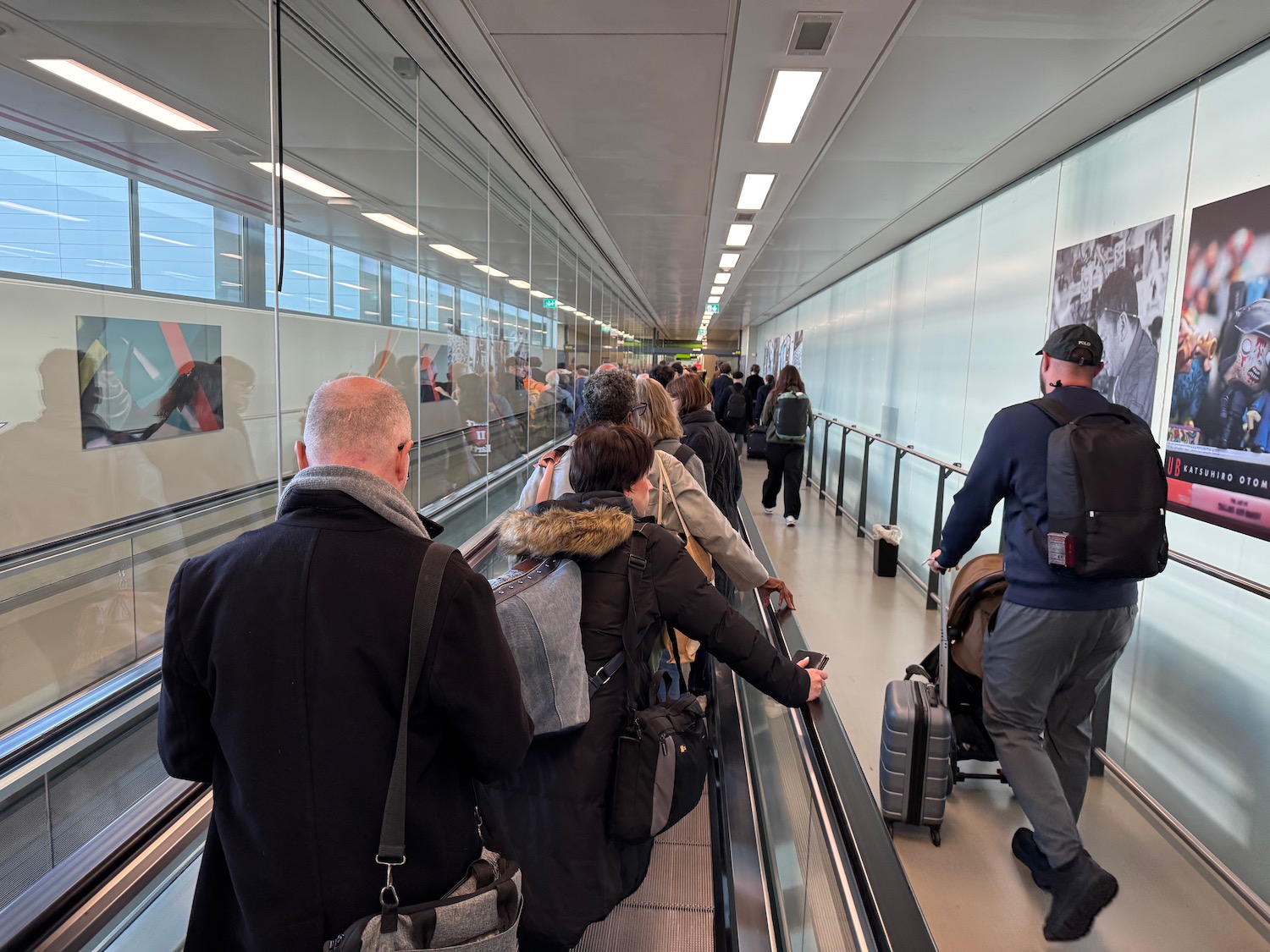 a group of people on an escalator