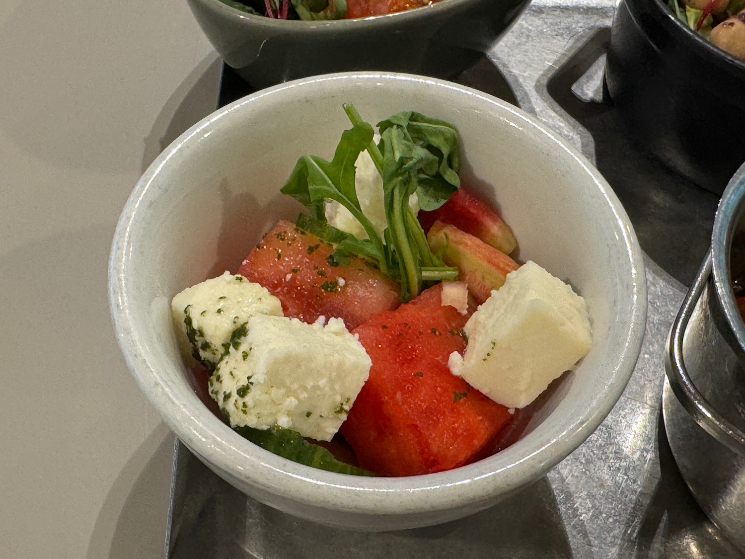 a bowl of food on a tray