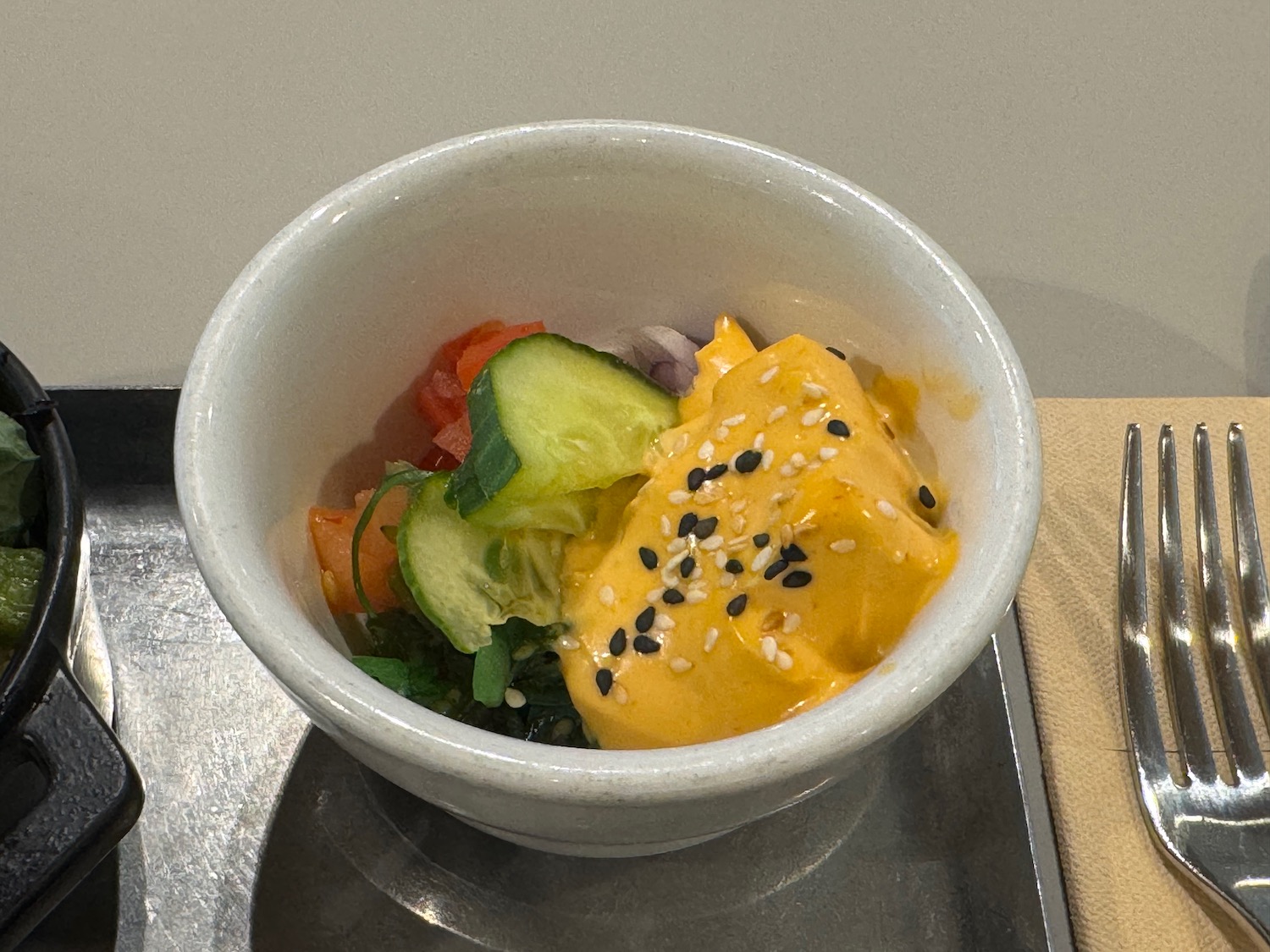 a bowl of food on a tray