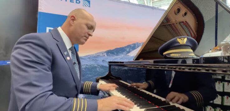 United Airlines pilot piano Denver Airport