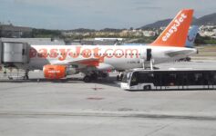 an airplane parked on a tarmac