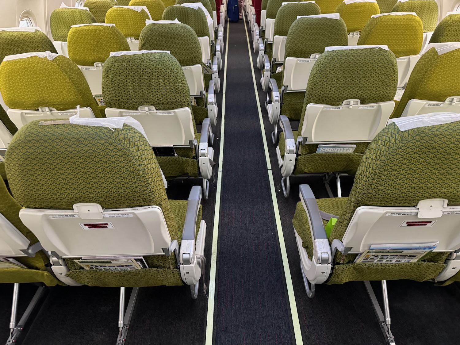 rows of seats in an airplane