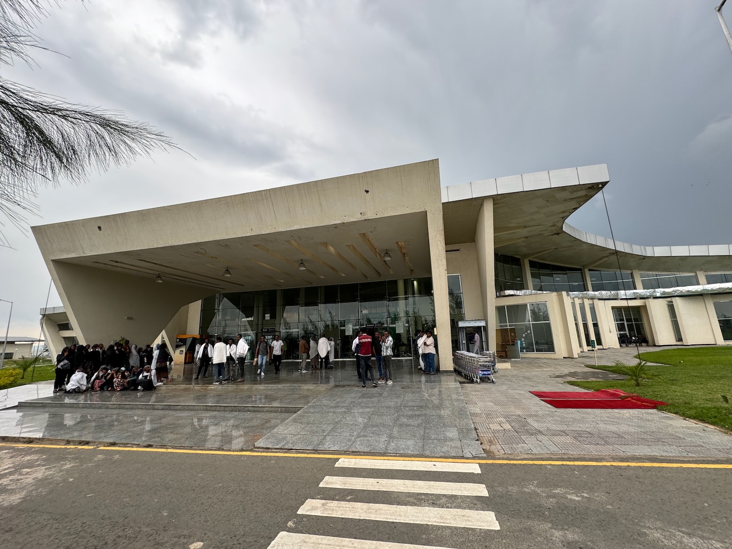 a group of people standing outside of a building