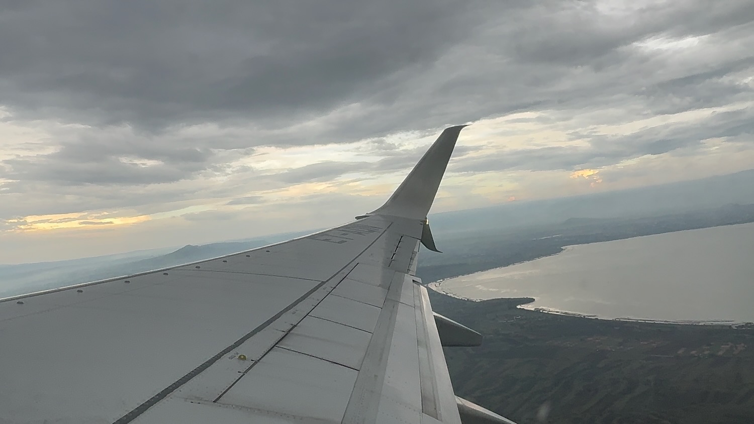 an airplane wing in the sky