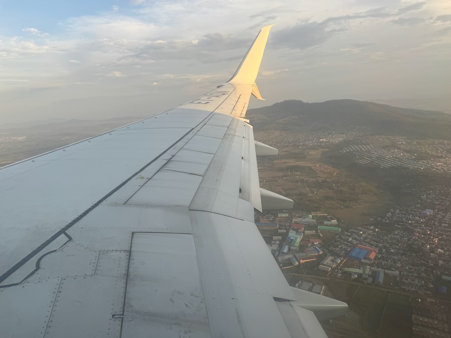 an airplane wing in the sky
