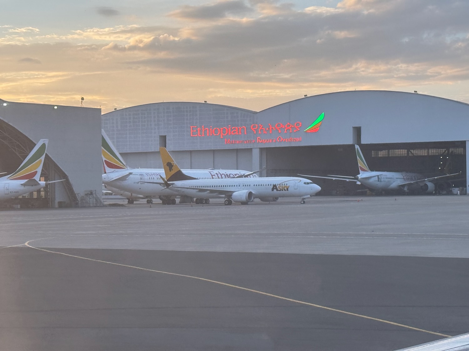 airplanes parked in a hangar