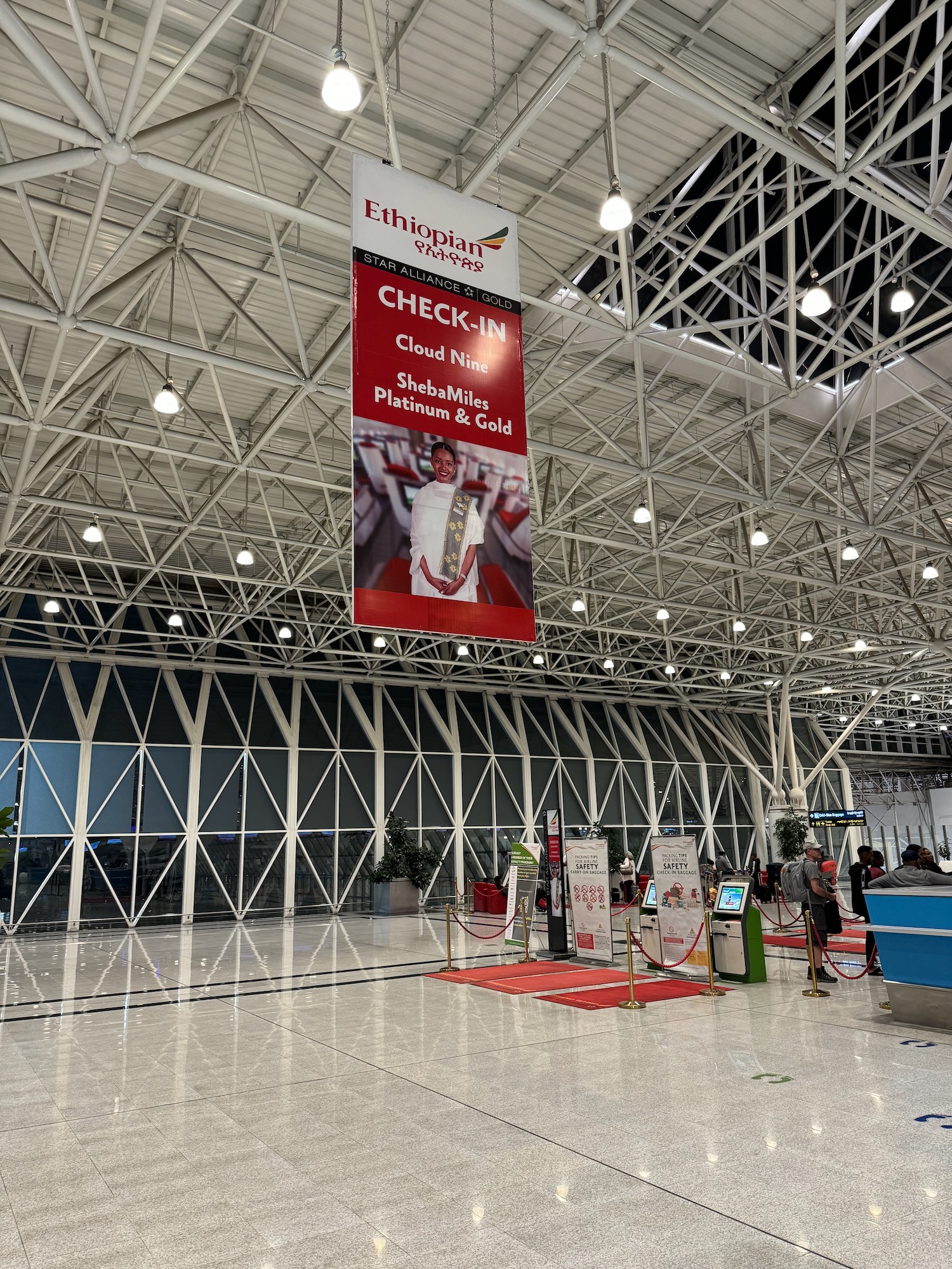 a large building with a sign from the ceiling