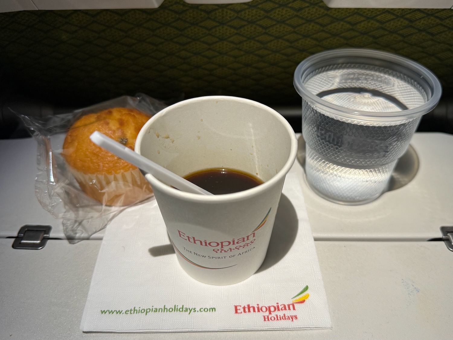 a cup of coffee and a cup of water