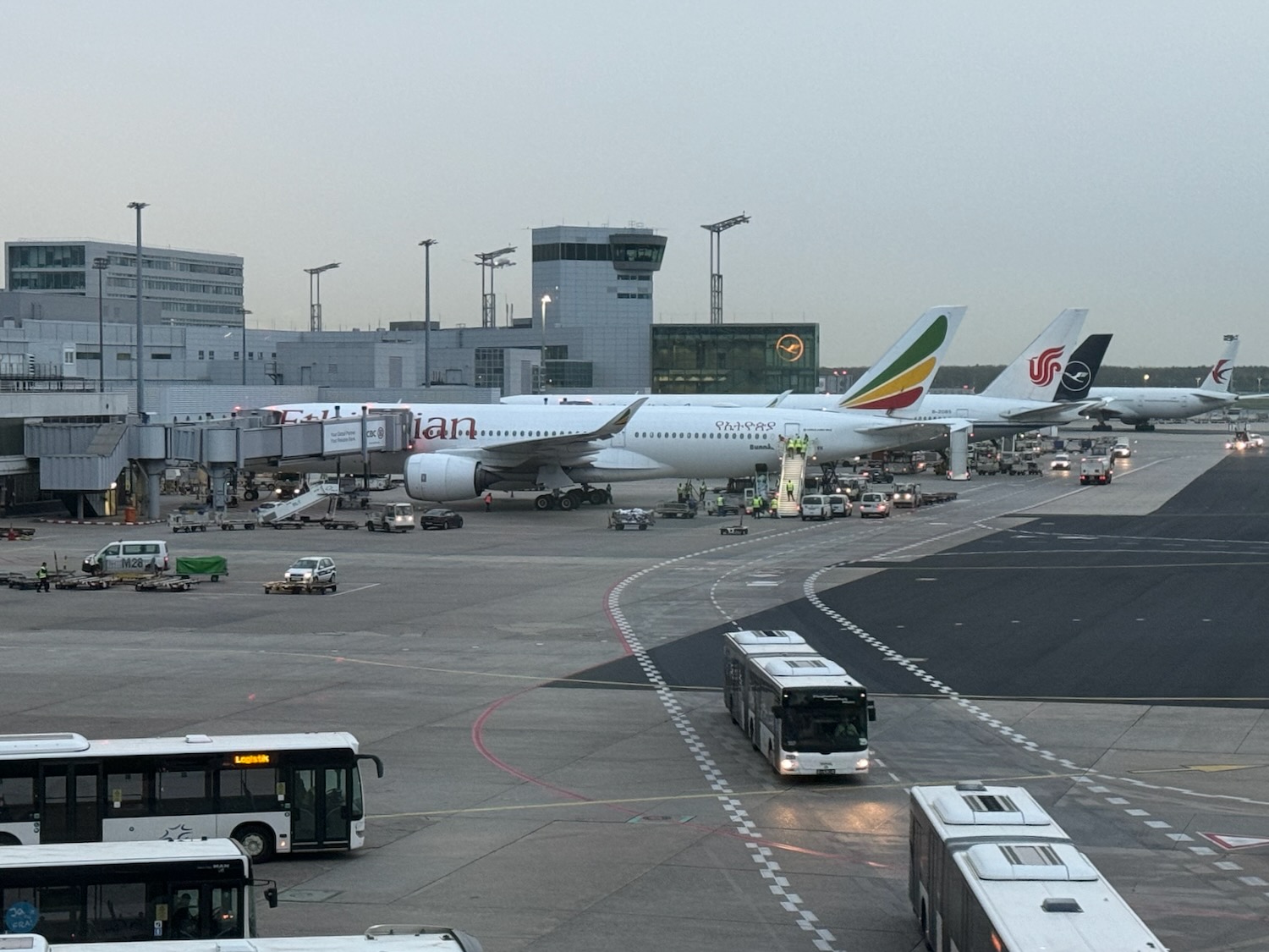 a large white airplane on a runway