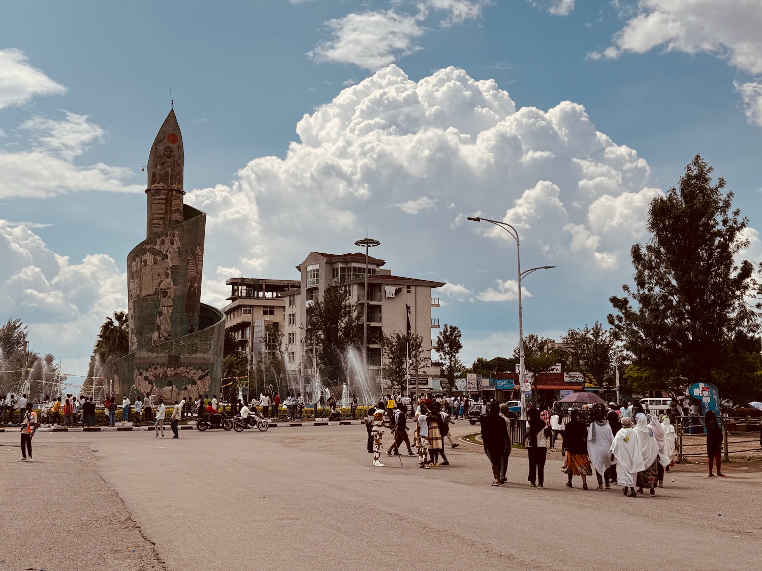a group of people walking on a street