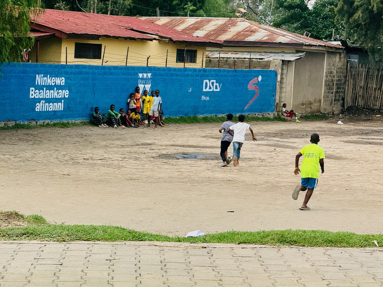 a group of people playing football