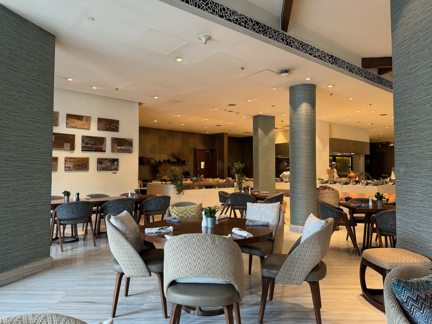 a restaurant with tables and chairs