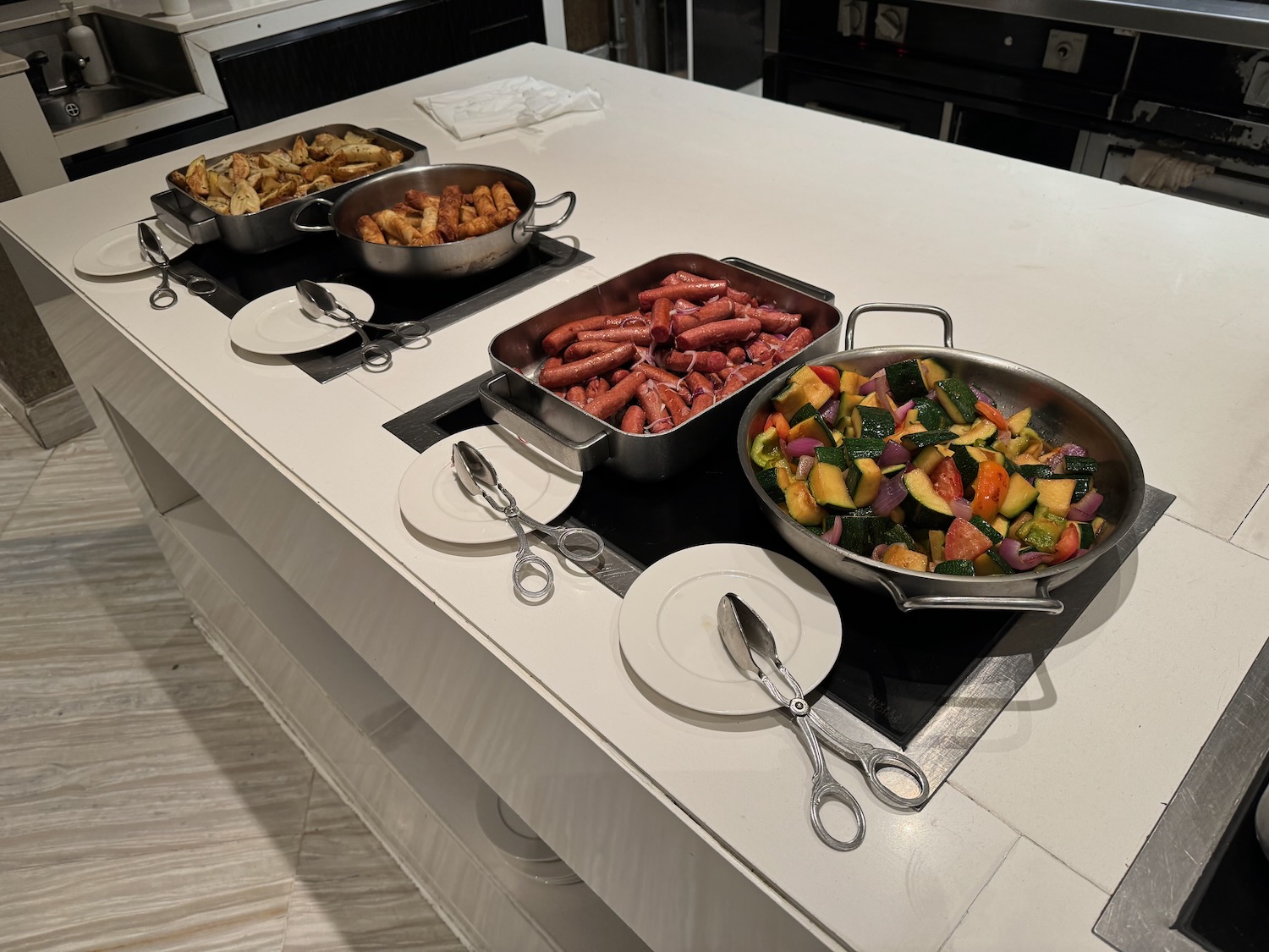 a group of pans with food in them