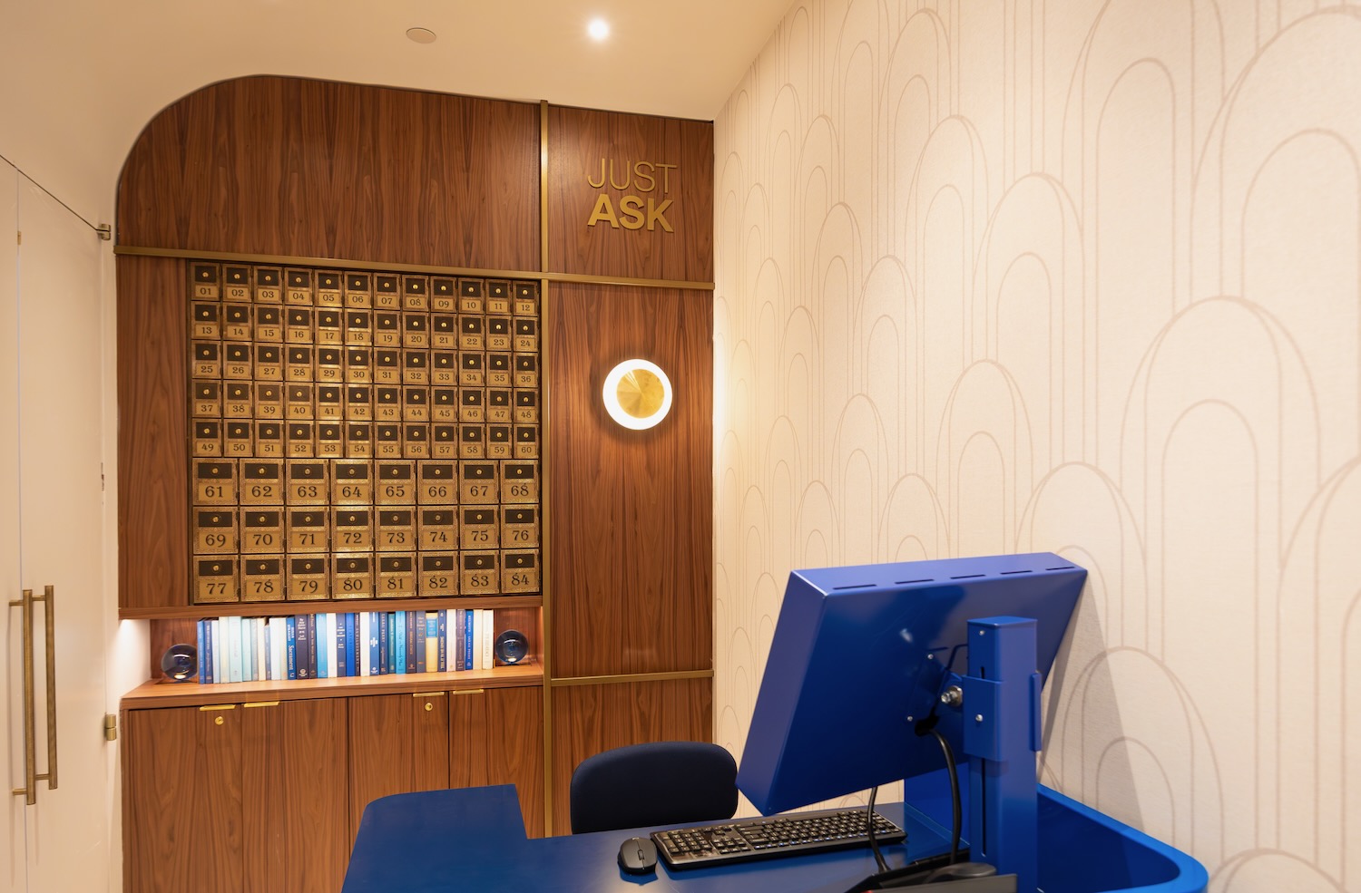 a computer on a desk in a room