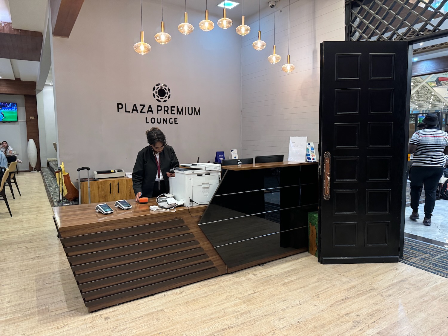 a person standing at a desk