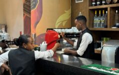 a man and woman at a bar