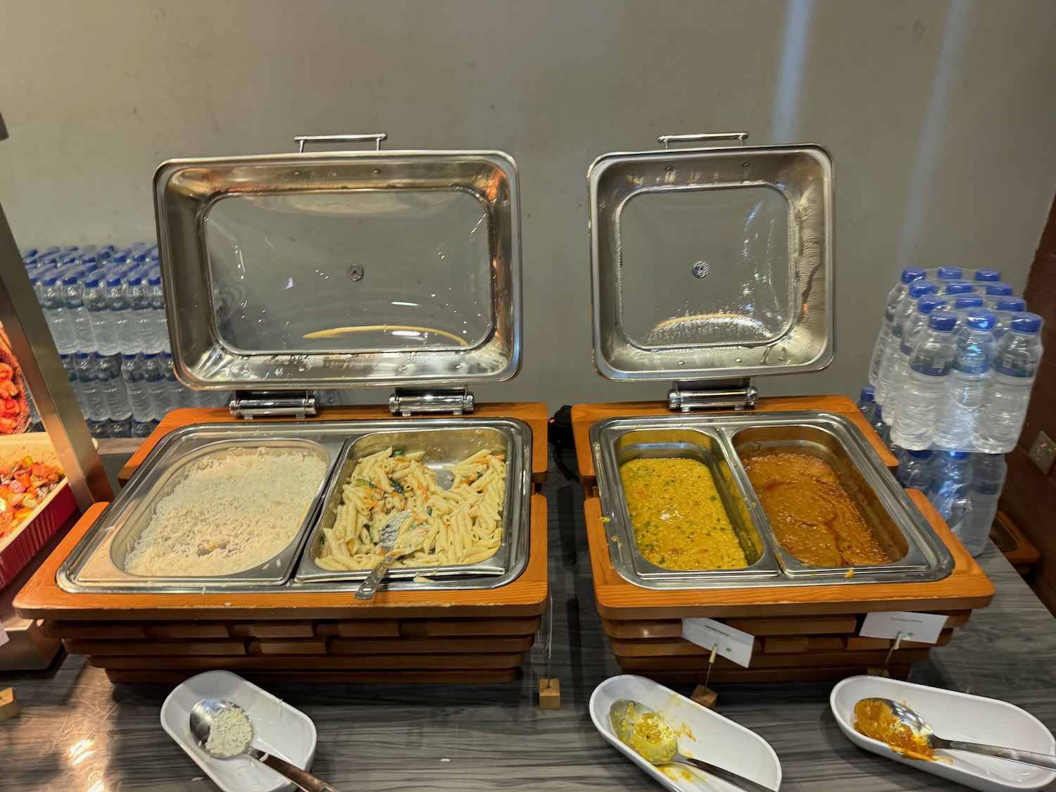 food in a buffet with containers