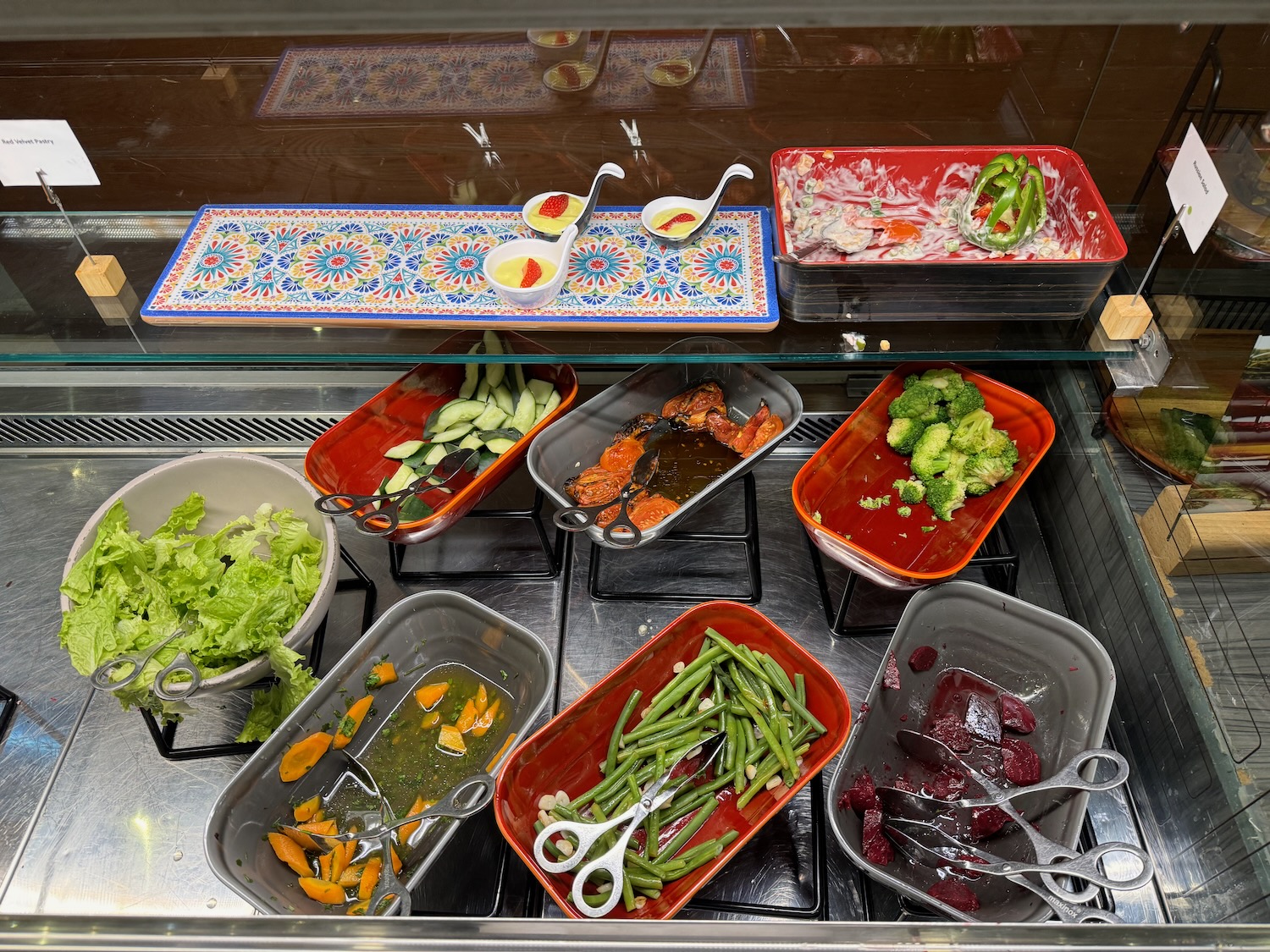 a trays of food in a buffet