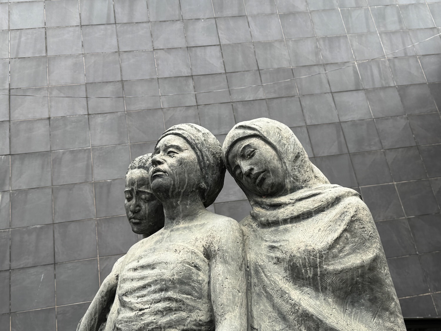 a statue of a woman and a man