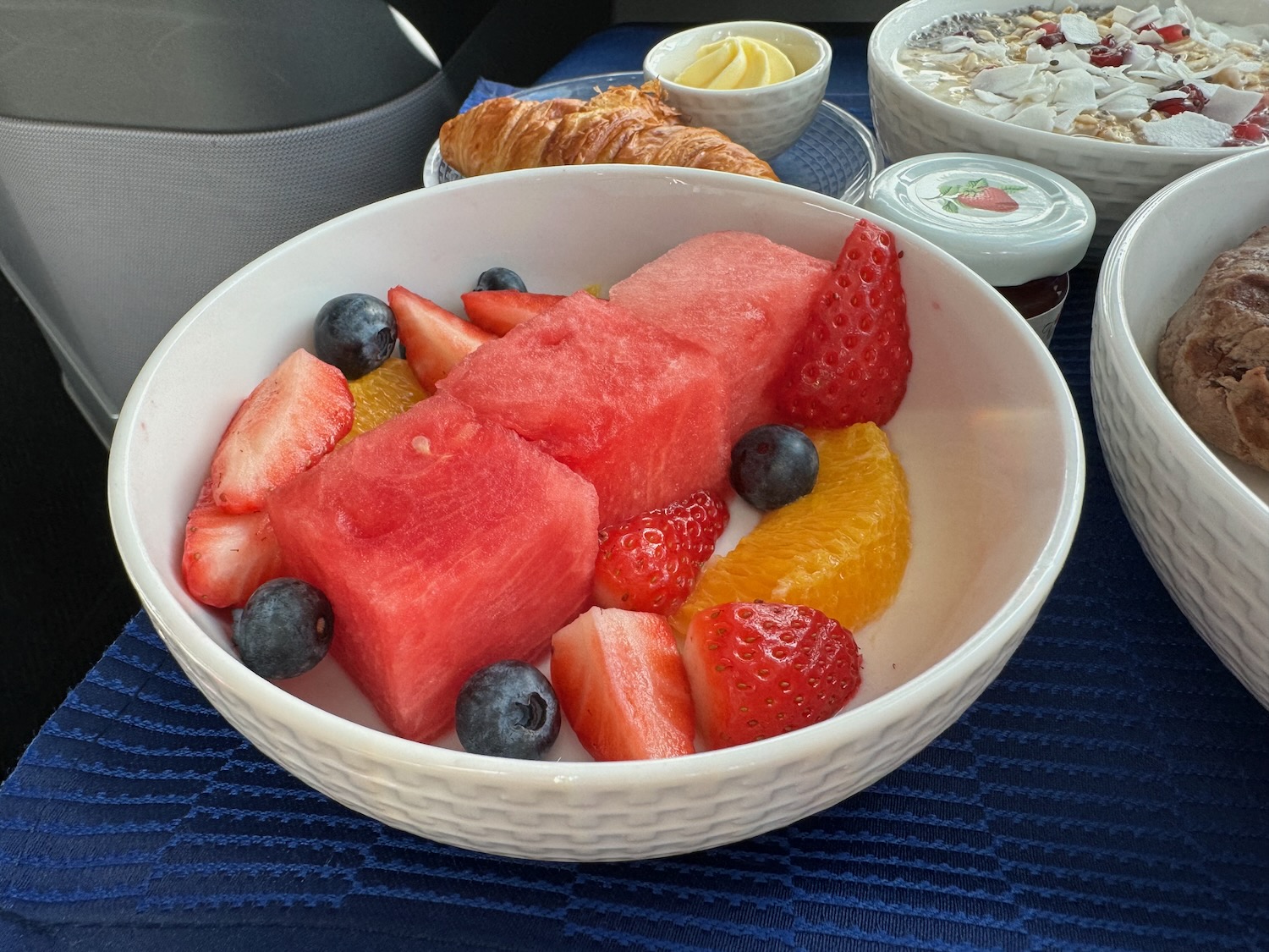 a bowl of fruit and yogurt