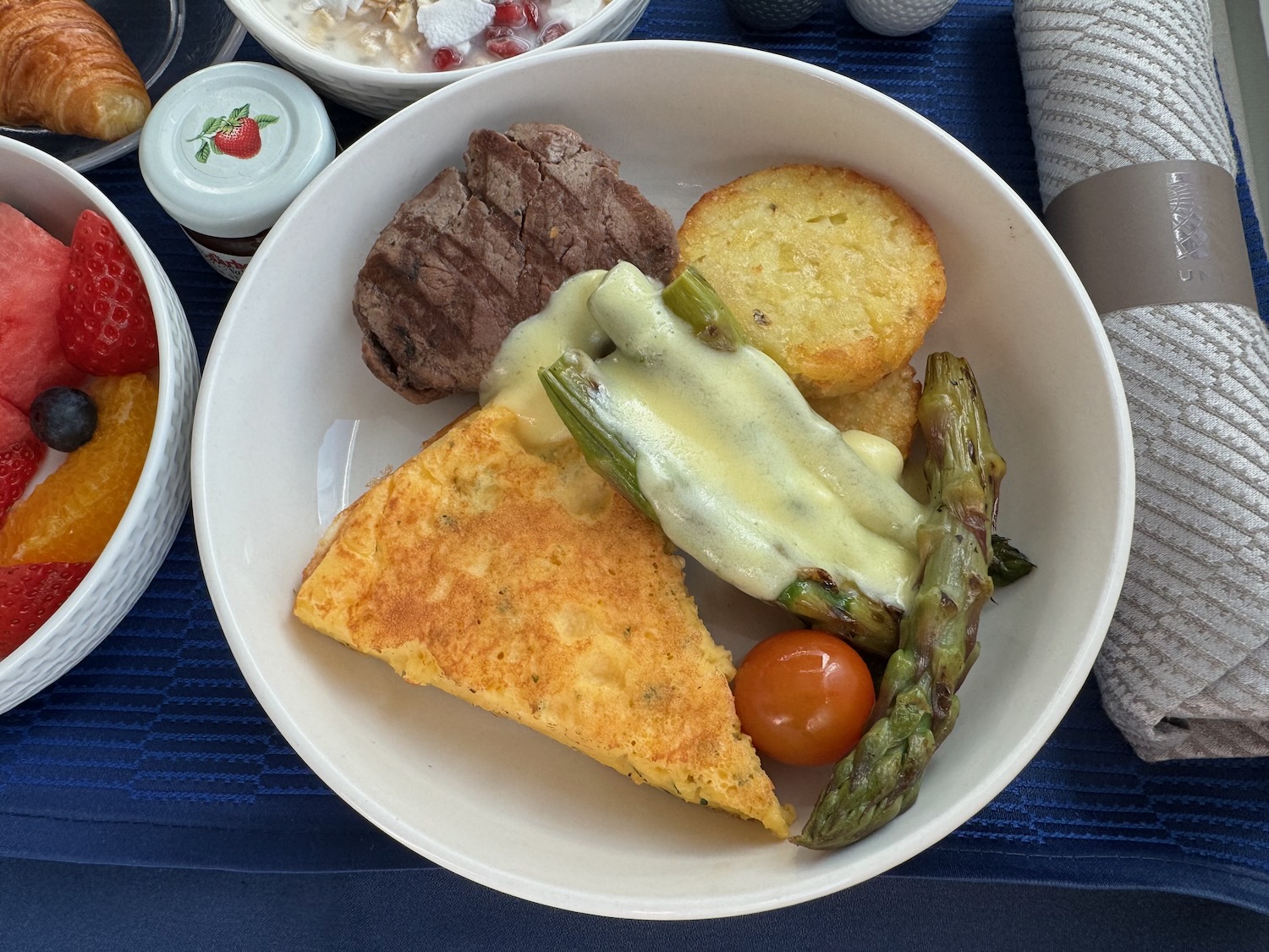 a plate of food with a white sauce