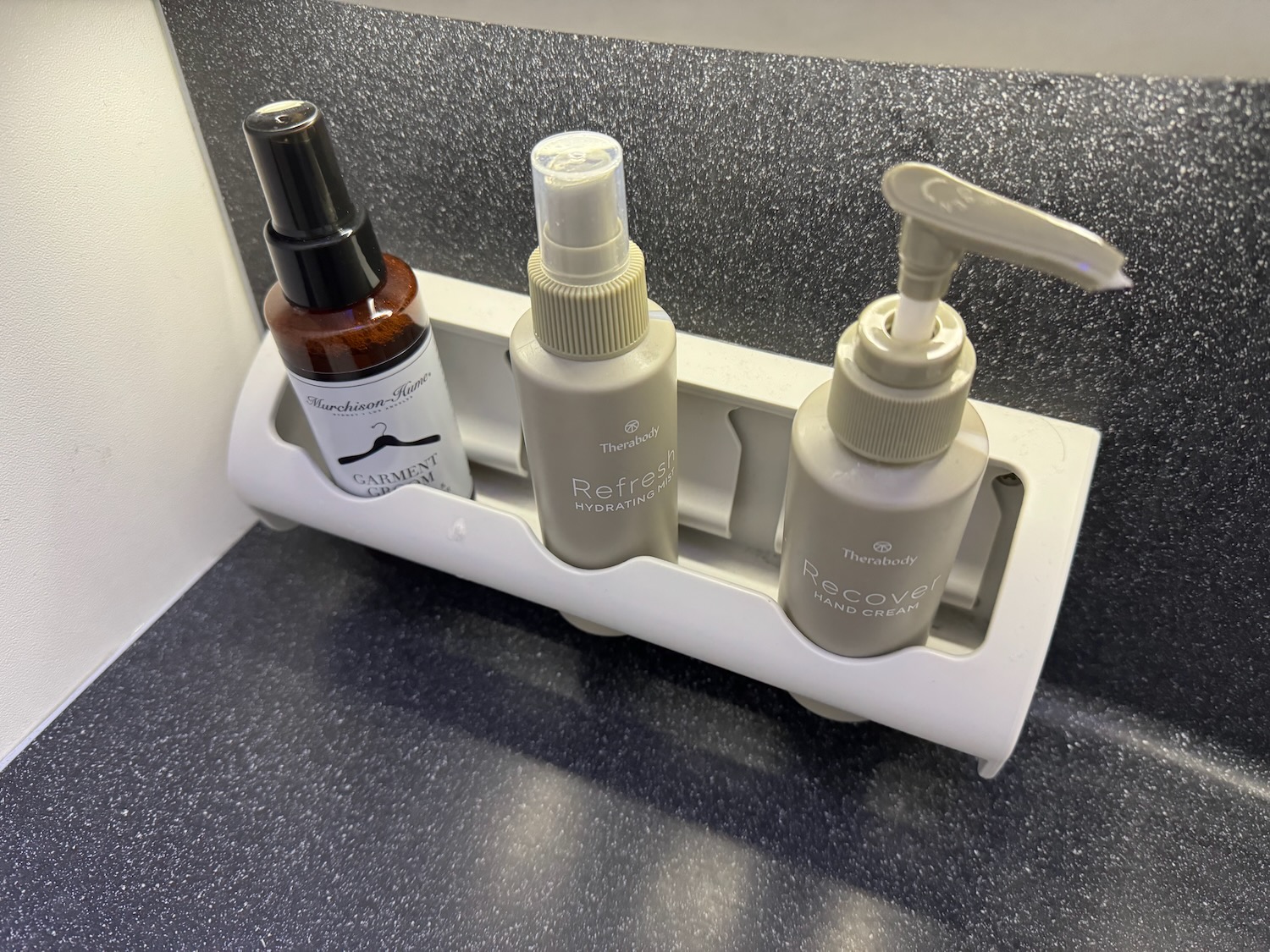 a group of bottles on a shelf