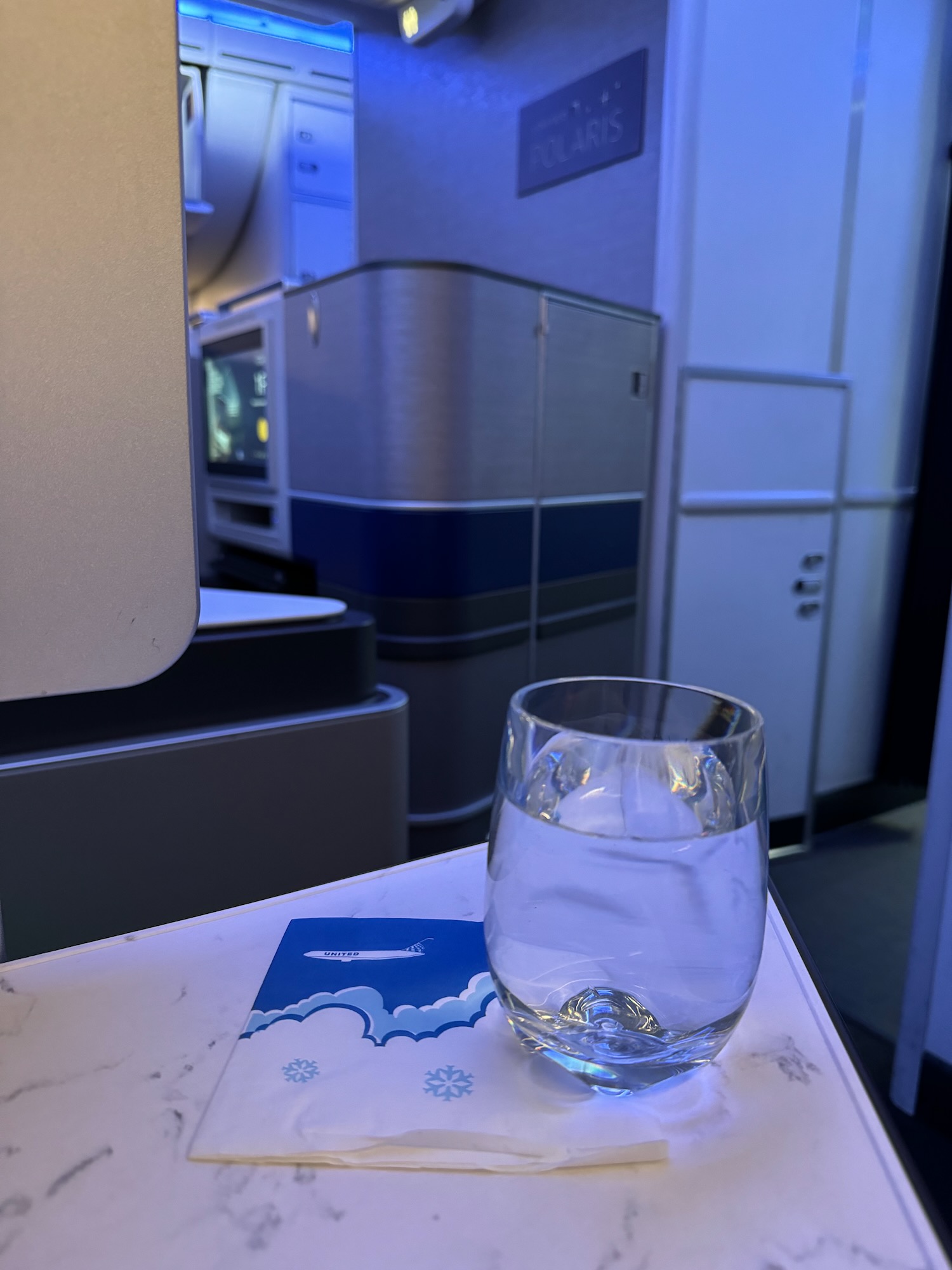 a glass of water on a table