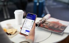 a hand holding a phone