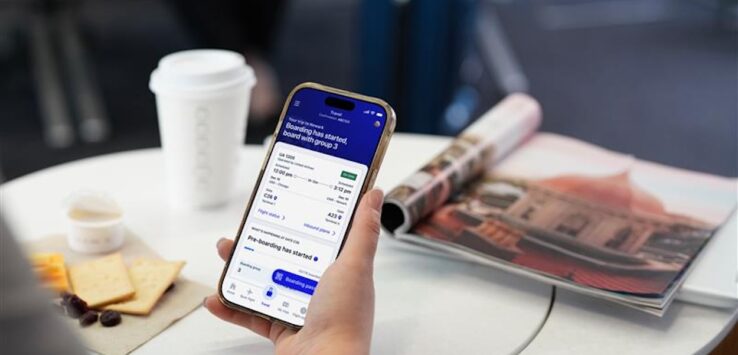 a hand holding a phone