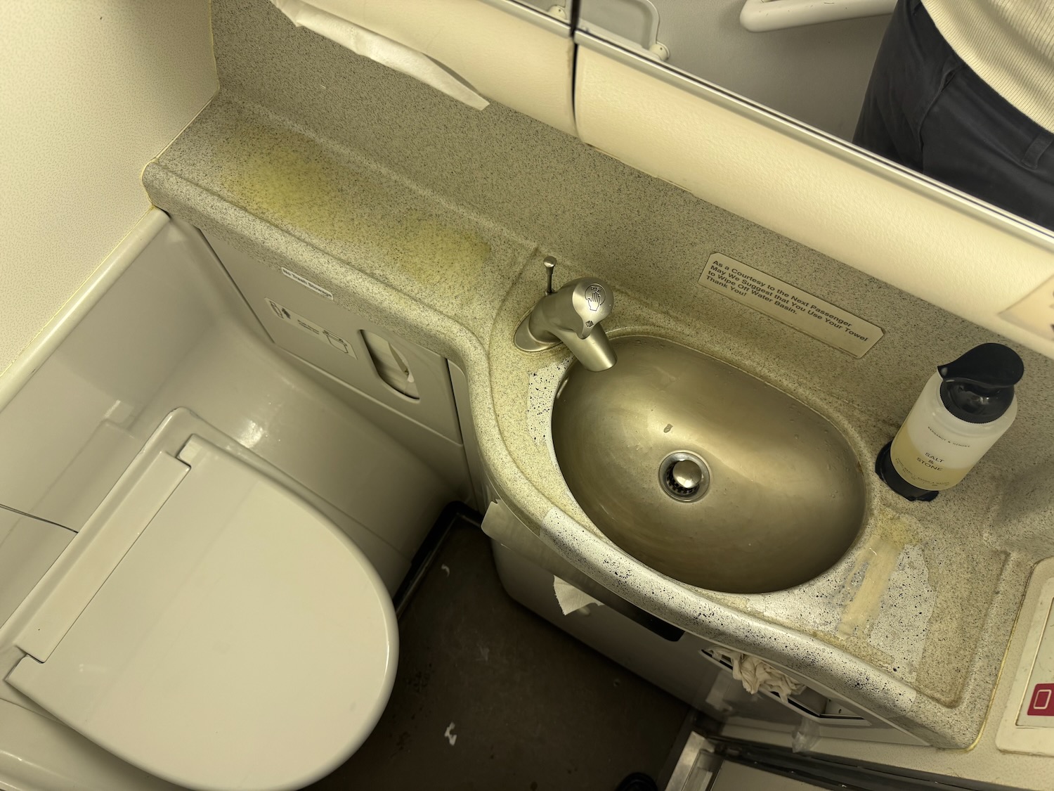 a sink and toilet in a bathroom