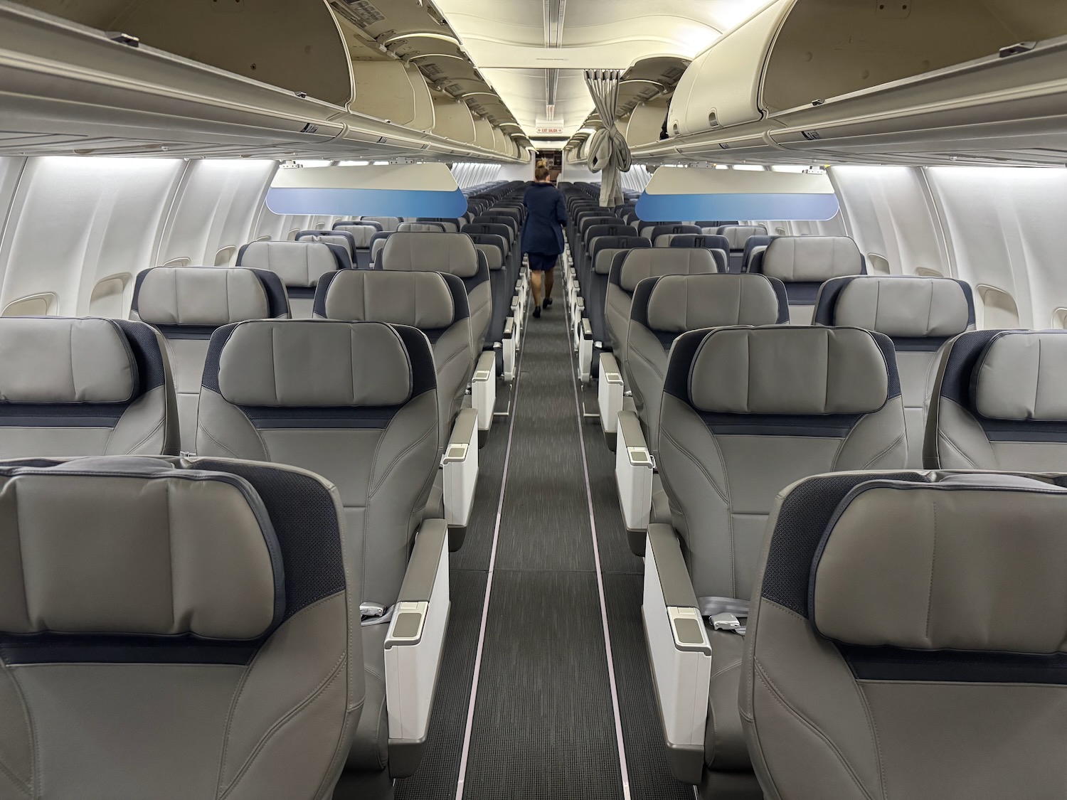 a person walking in an airplane