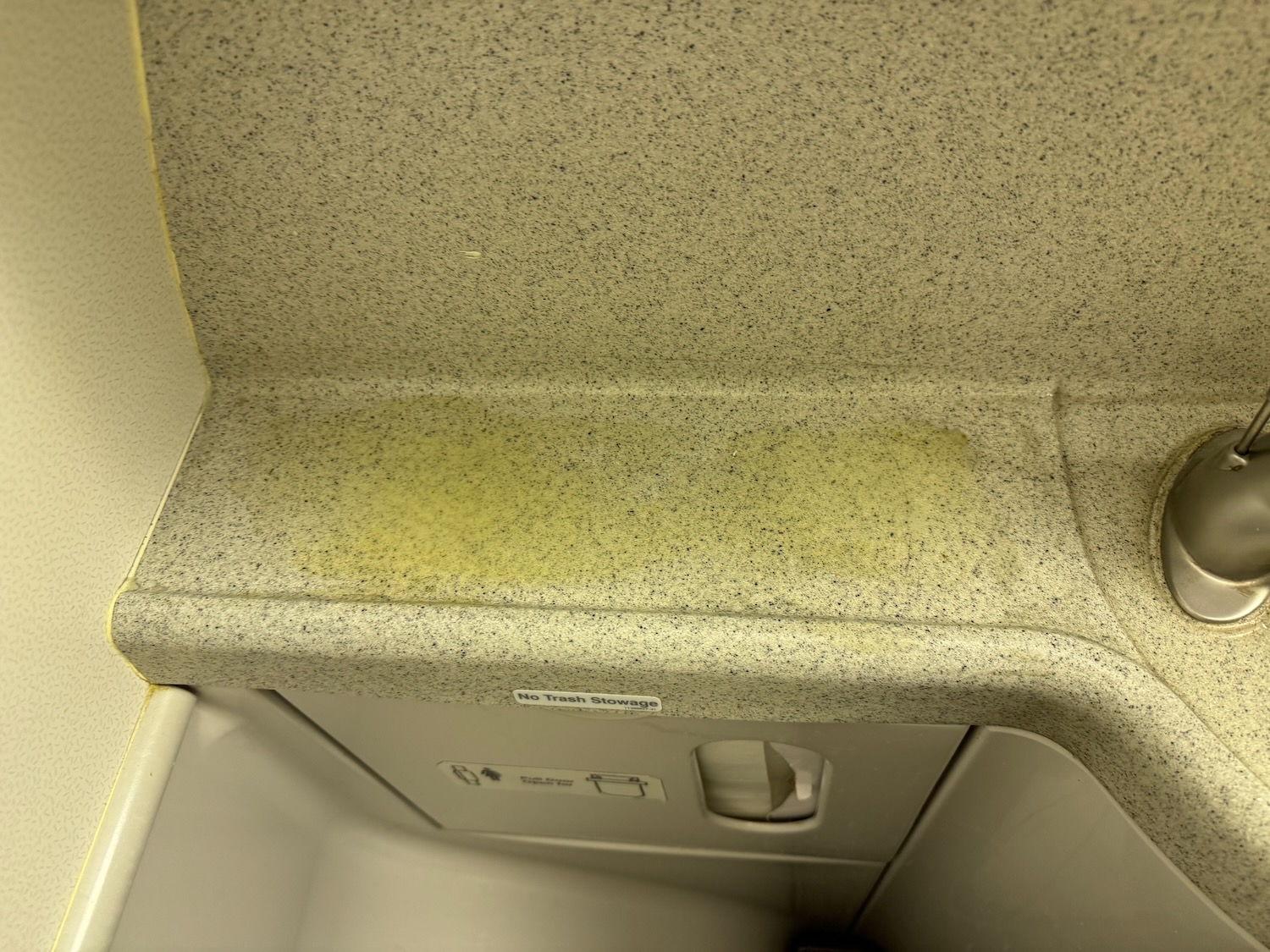 a yellow stain on a counter