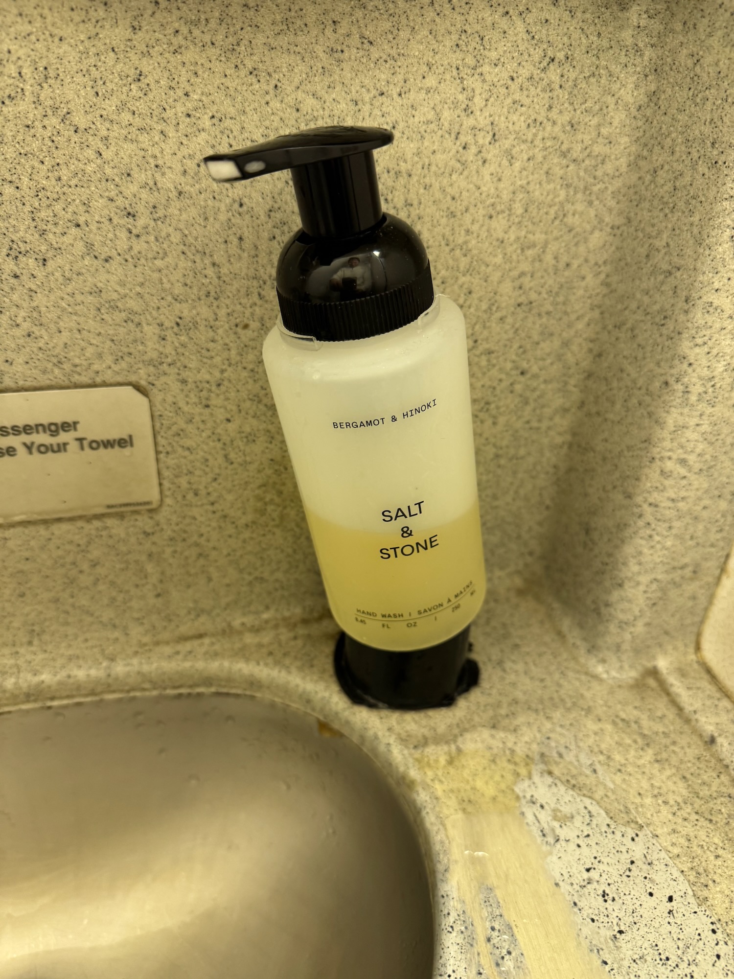 a soap dispenser on a sink