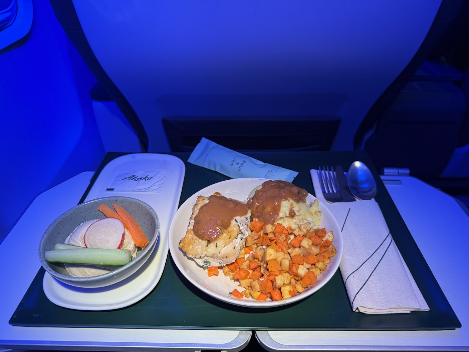 a plate of food on a tray