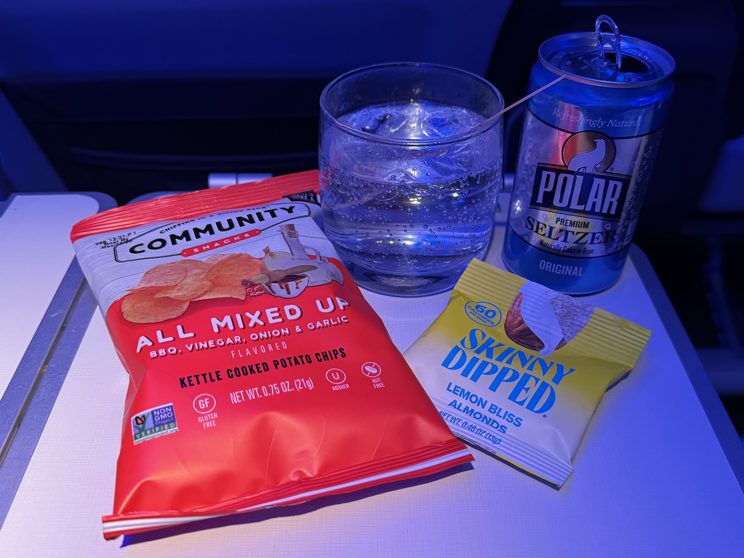 a drink and chips on a table