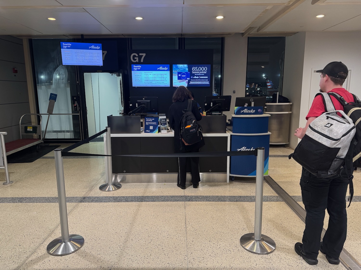 people standing in front of a counter