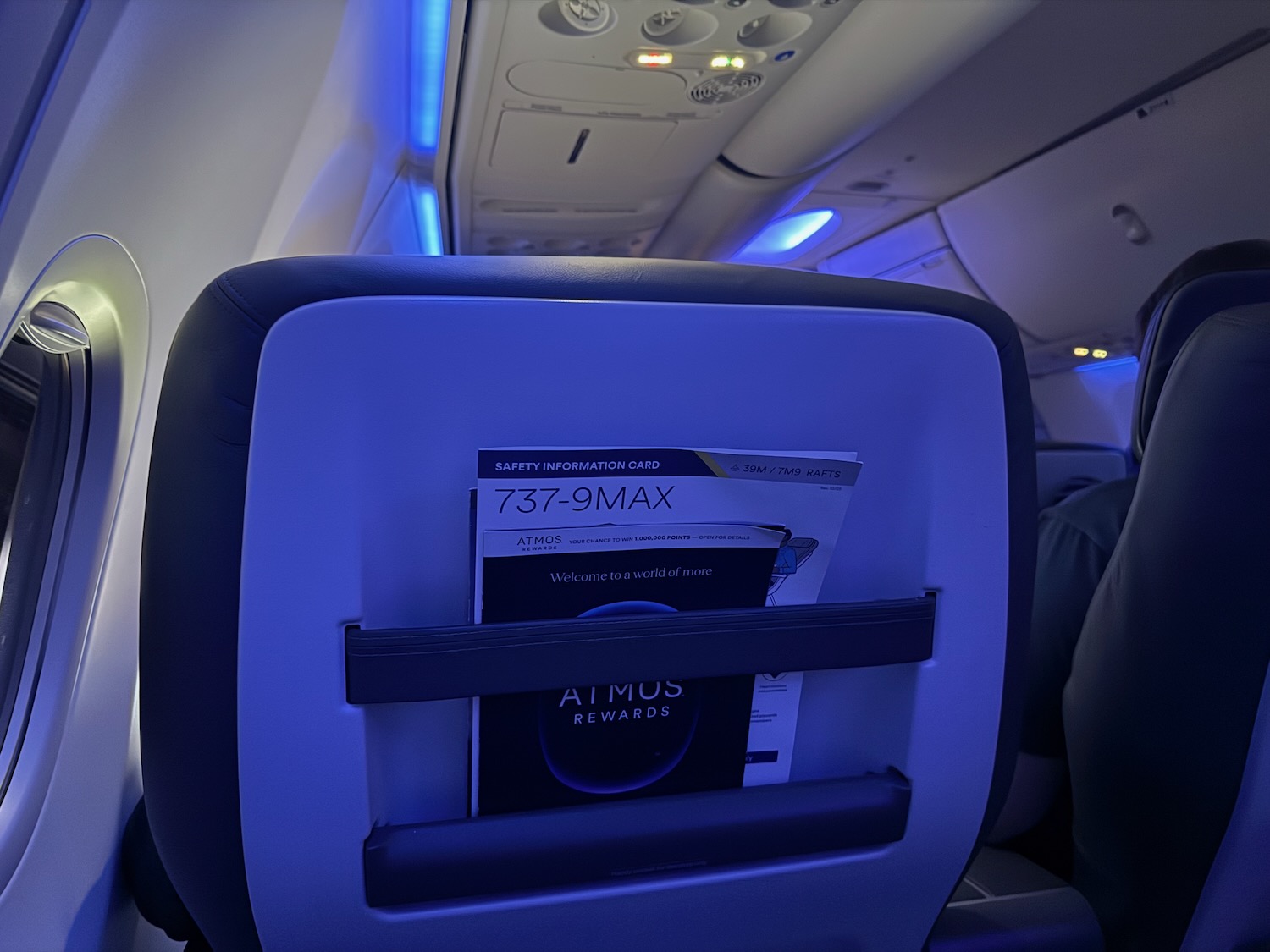 a seat with a magazine in it