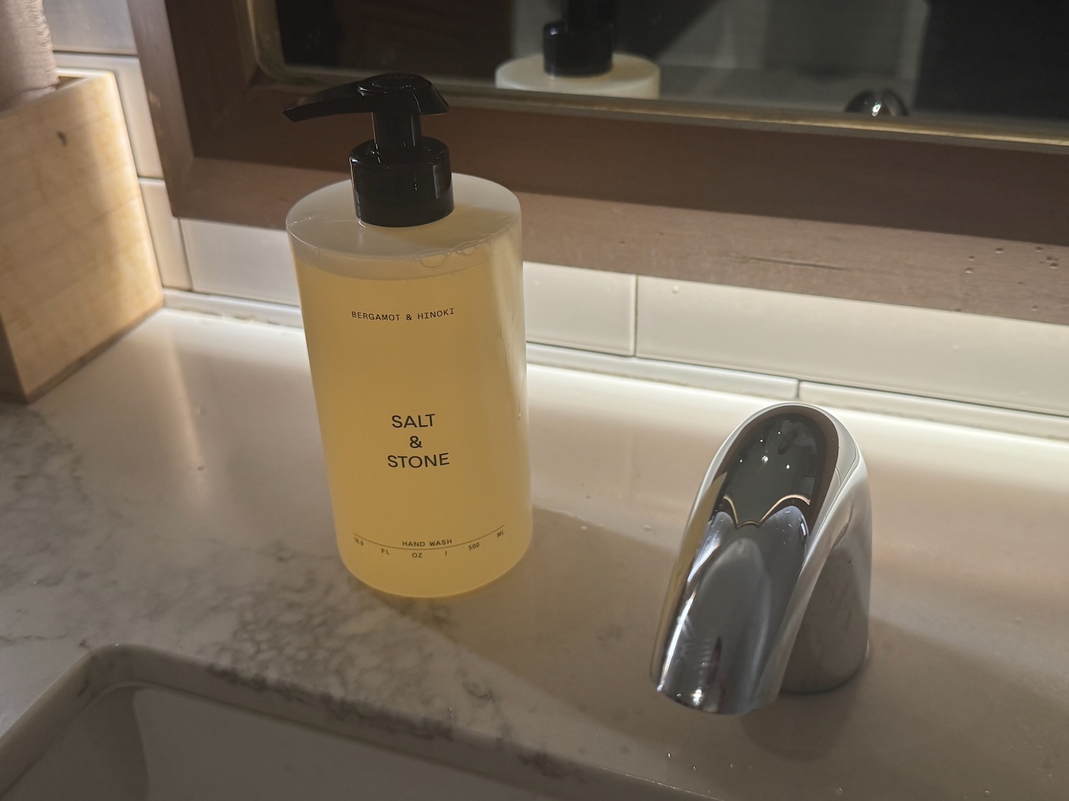a soap dispenser on a sink