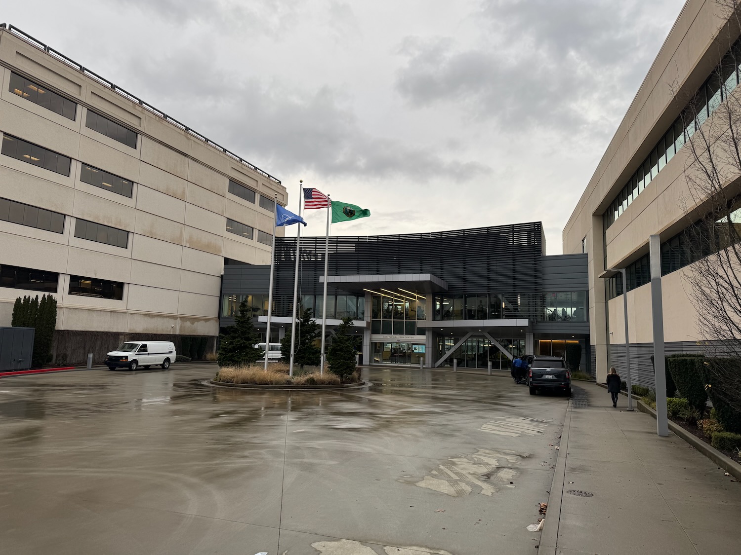 a building with flags in front of it