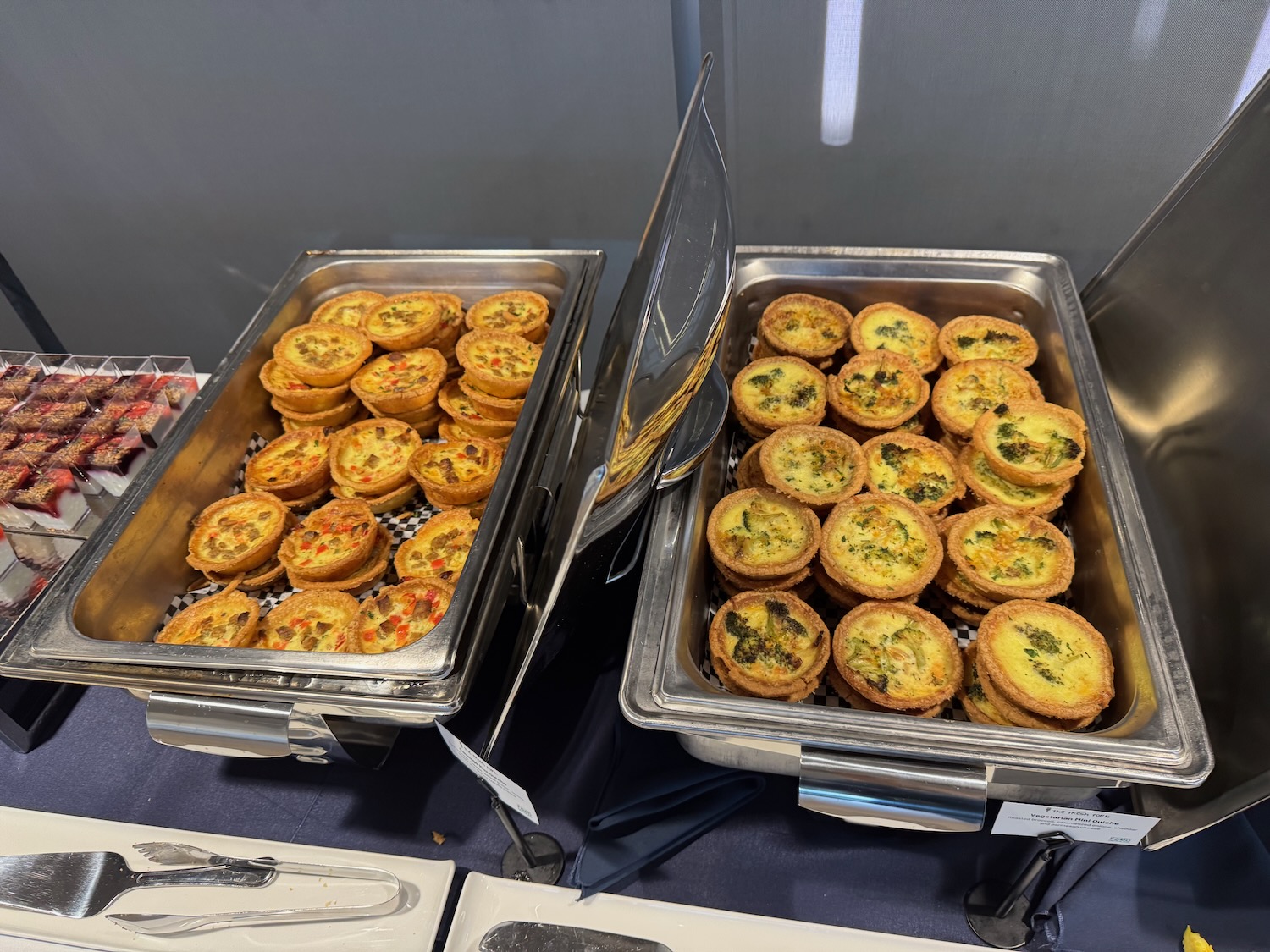 a group of trays of food