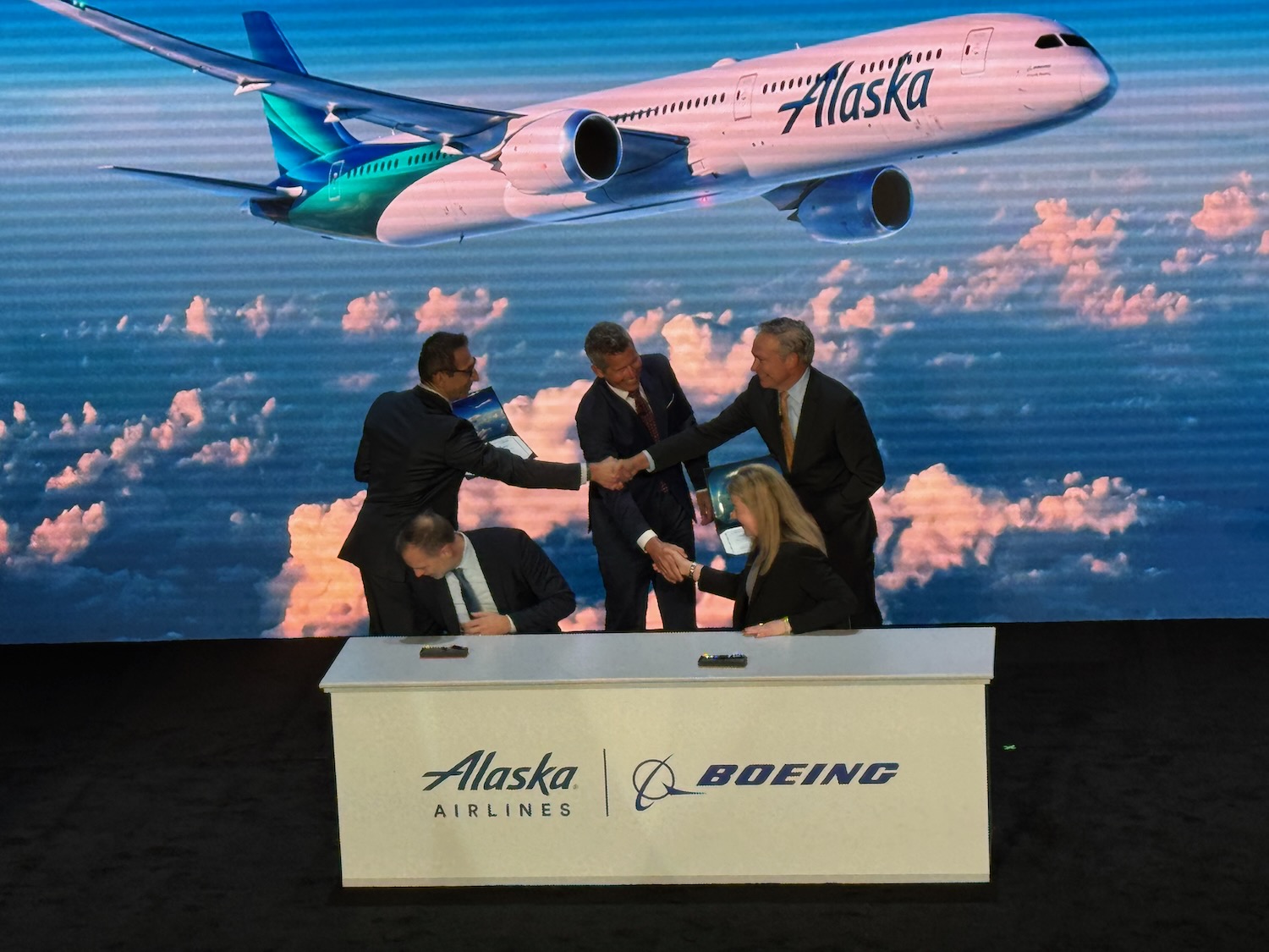 a group of people shaking hands