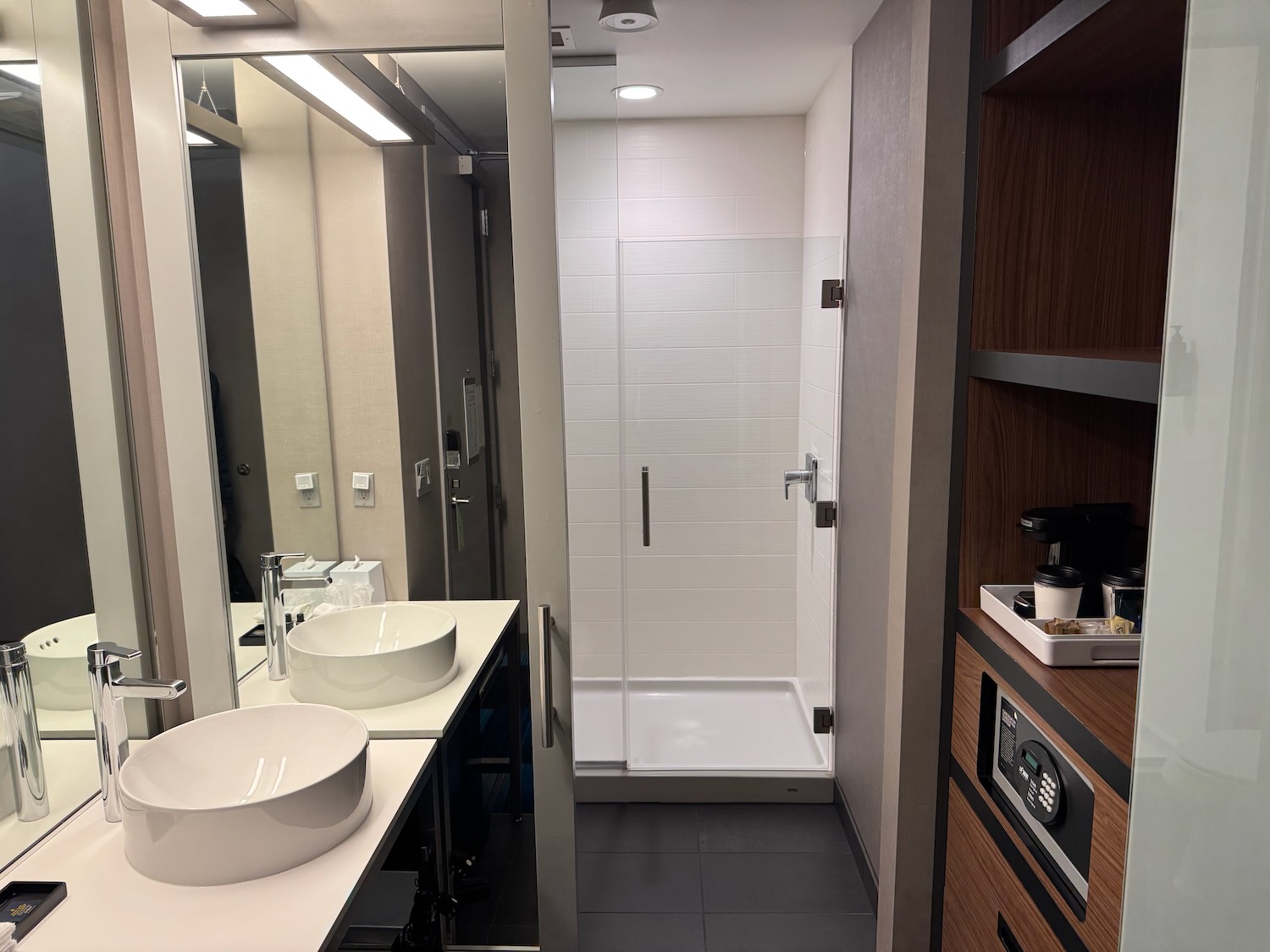 a bathroom with a shower and sink