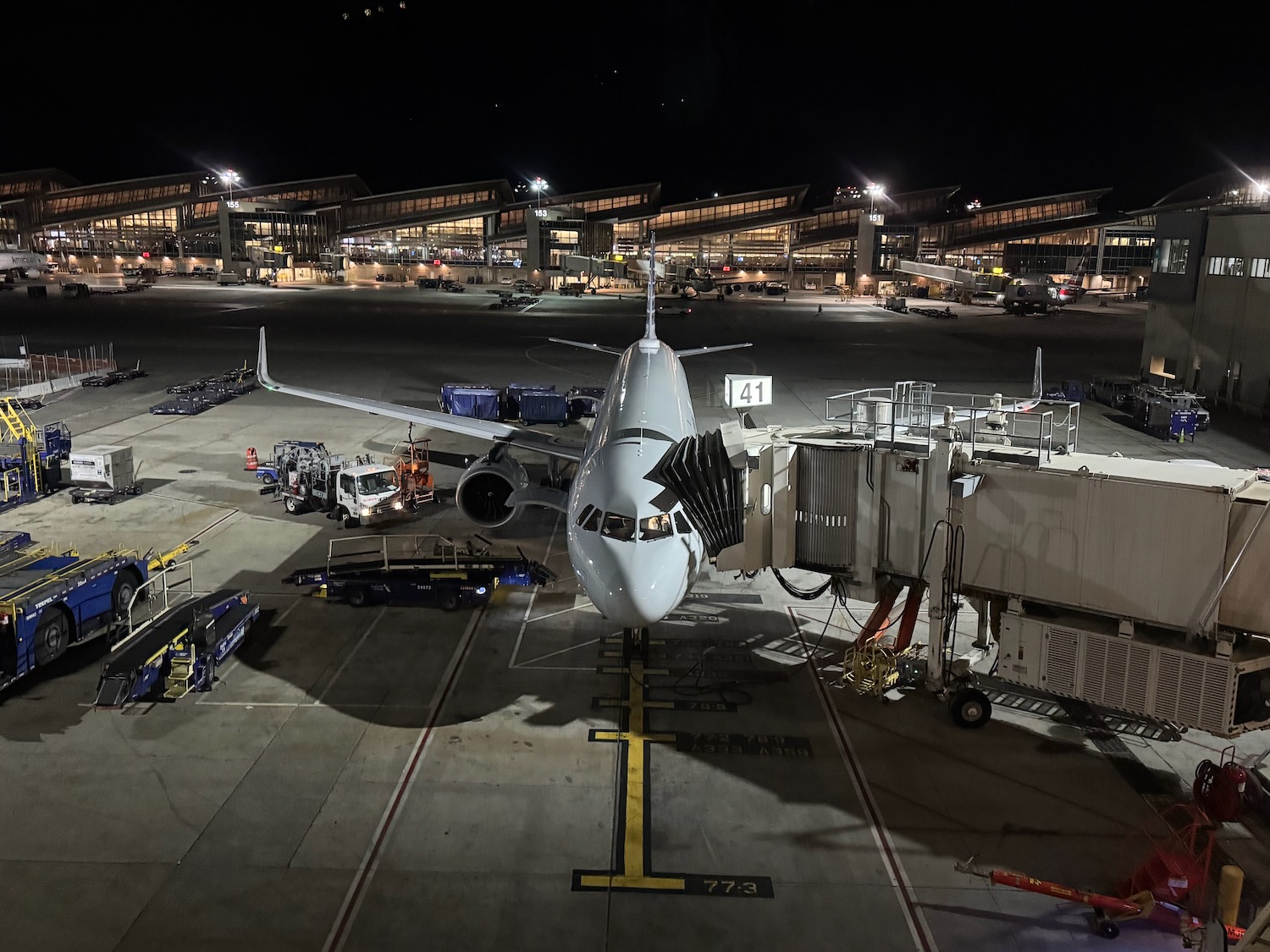 an airplane on a runway at night