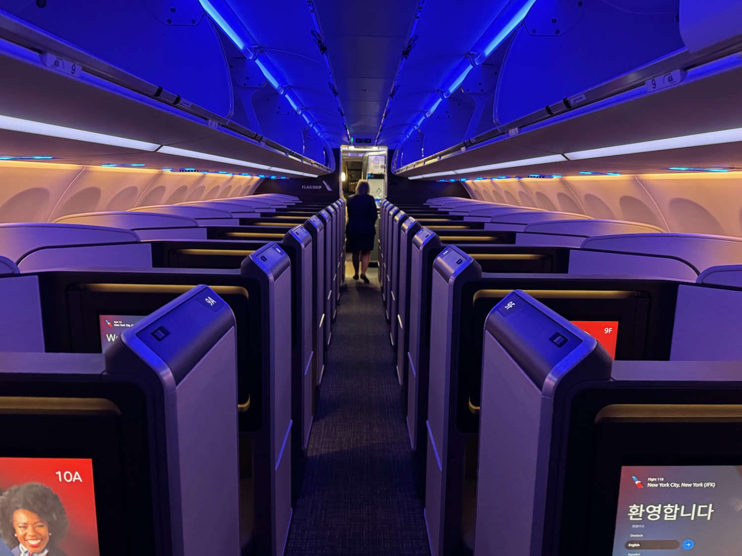 a person walking in an airplane